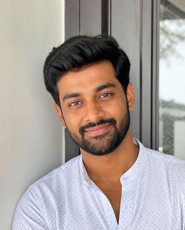 Illustrative portrait of a model, shown as Arjun